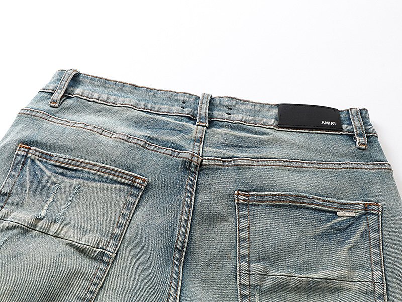 AMIRI Light Blue Distressed Denim Shorts — detail