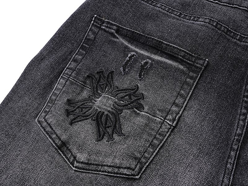 AMIRI Black Distressed Embroidered Jeans — detail